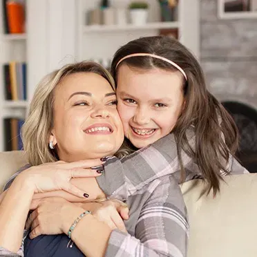 A child with braces at Payne Orthodontics in Santa Rosa